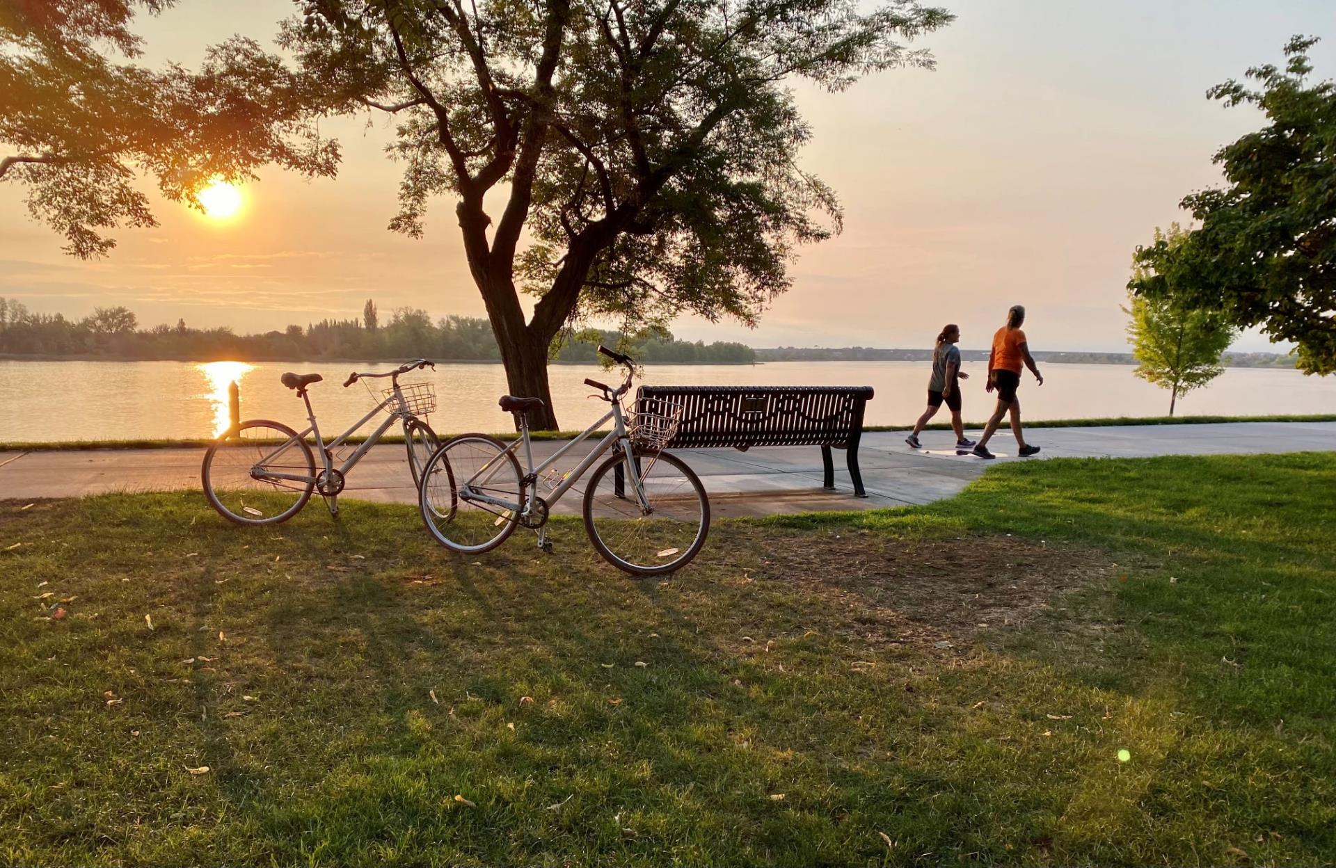 sunrise on the columbia river bicyclist and walkers